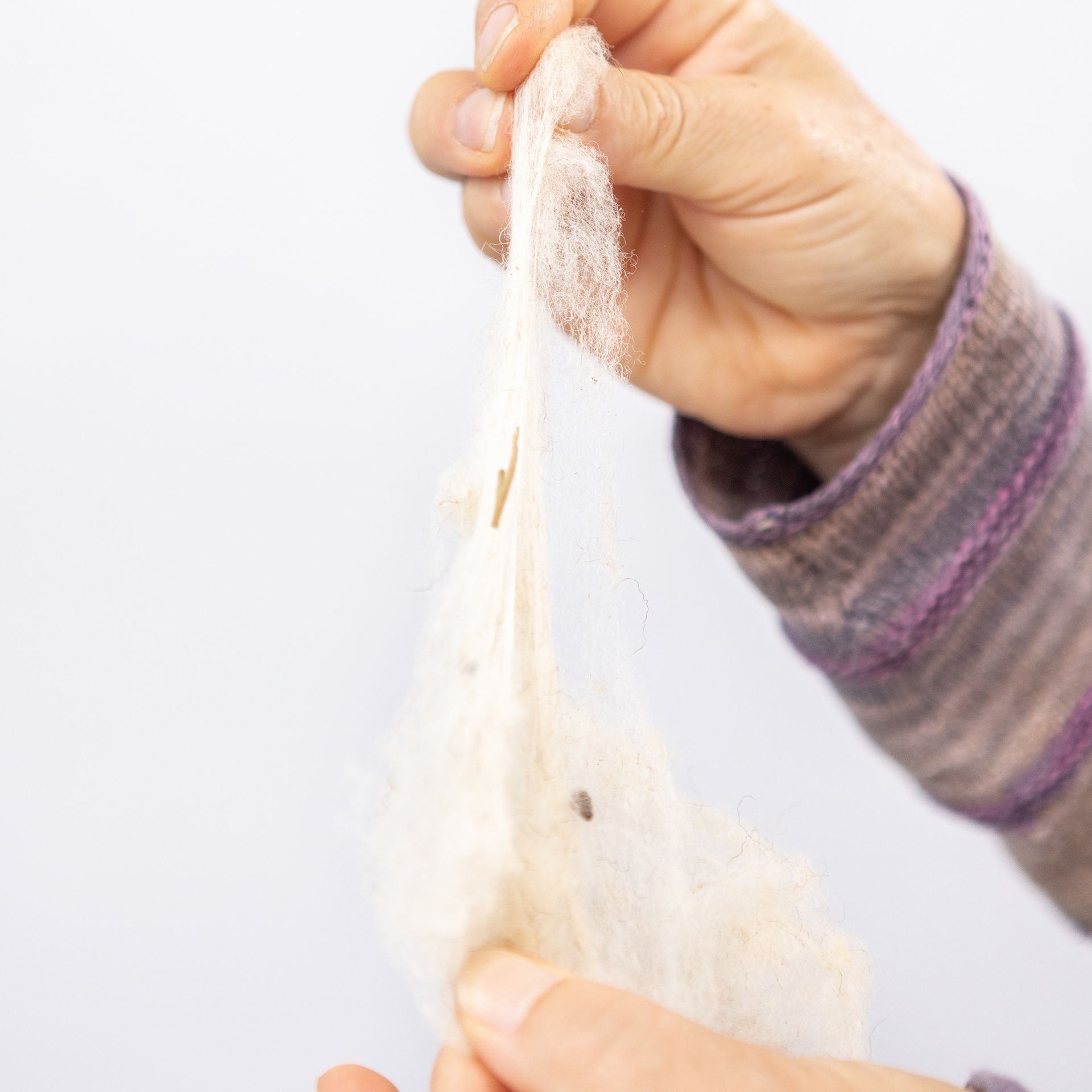 Fadenspinner Flockenwolle vom Schaf im Baumwollbeutel